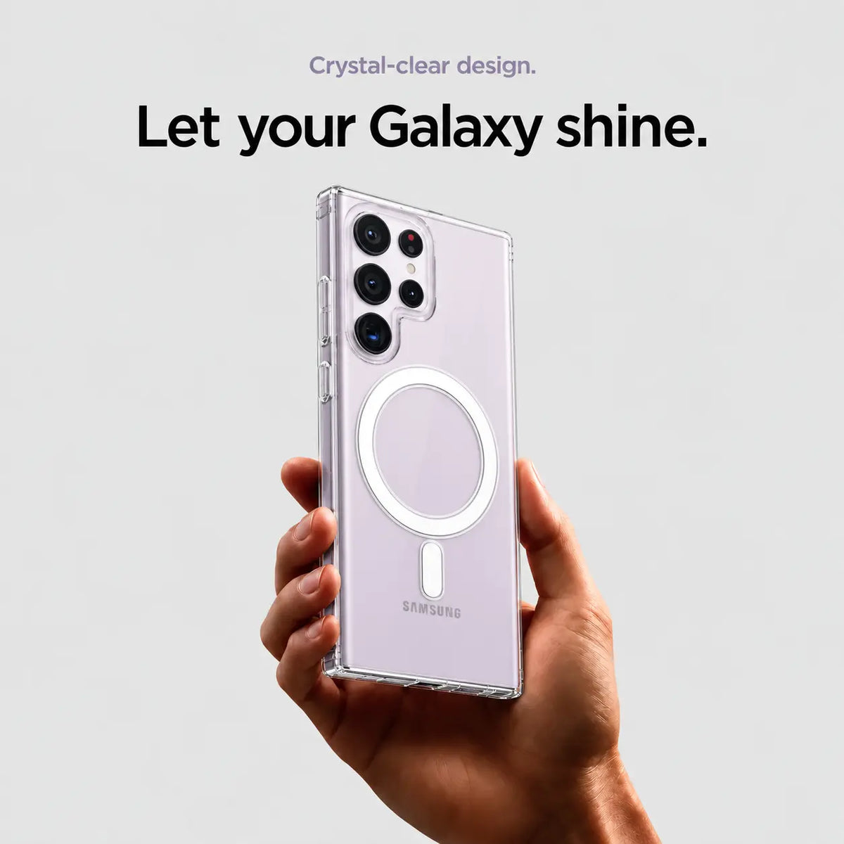 Clear magnetic Samsung case on a lavender phone held in one hand