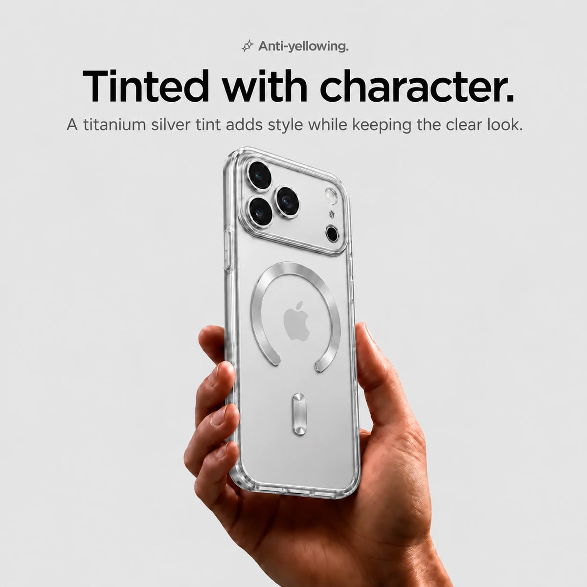 Silver tinted magnetic phone case held upright in one hand #color_Titanium Silver